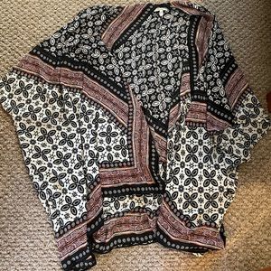 Size L/XL Kimono from Maurices. Great condition.